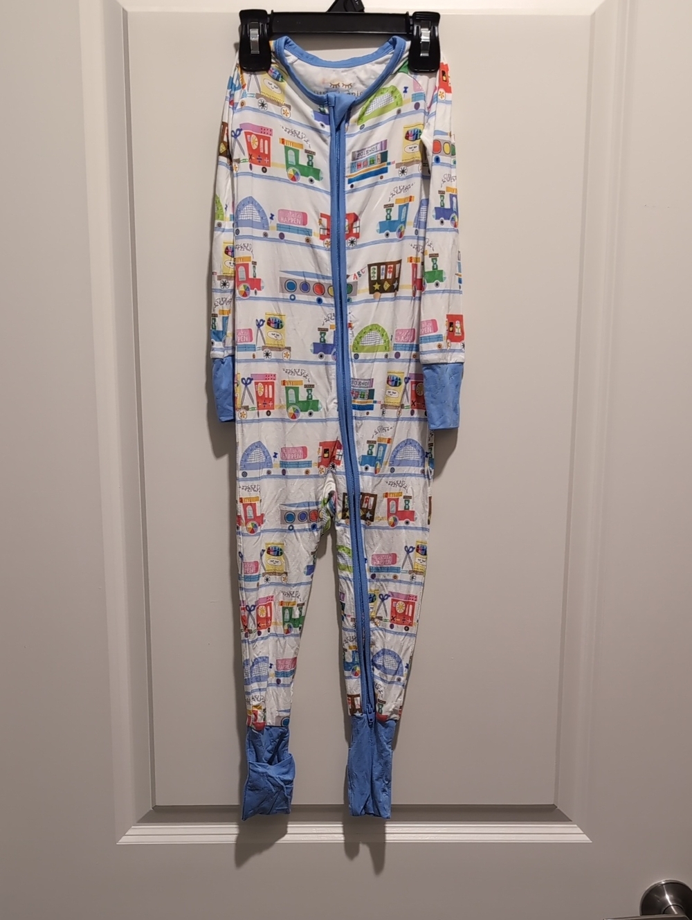 Little Sleepies White One-Piece Footie with Multicolor Train Print and Blue Trim